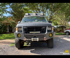 2002 Ford E-350 turbo diesel  Quigley Wheeled Coach