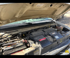 2002 Ford E-350 turbo diesel  Quigley Wheeled Coach