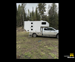 Custom overland flatbed truck camper