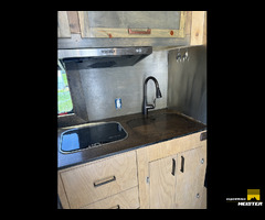 Custom overland flatbed truck camper
